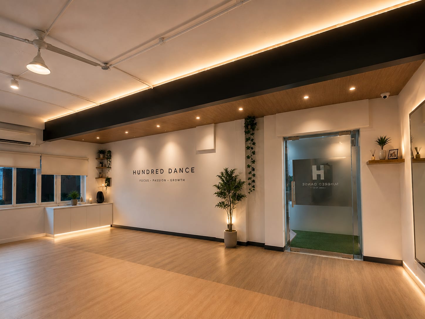 Empty 1 HUNDRED Dance studio with brand wall